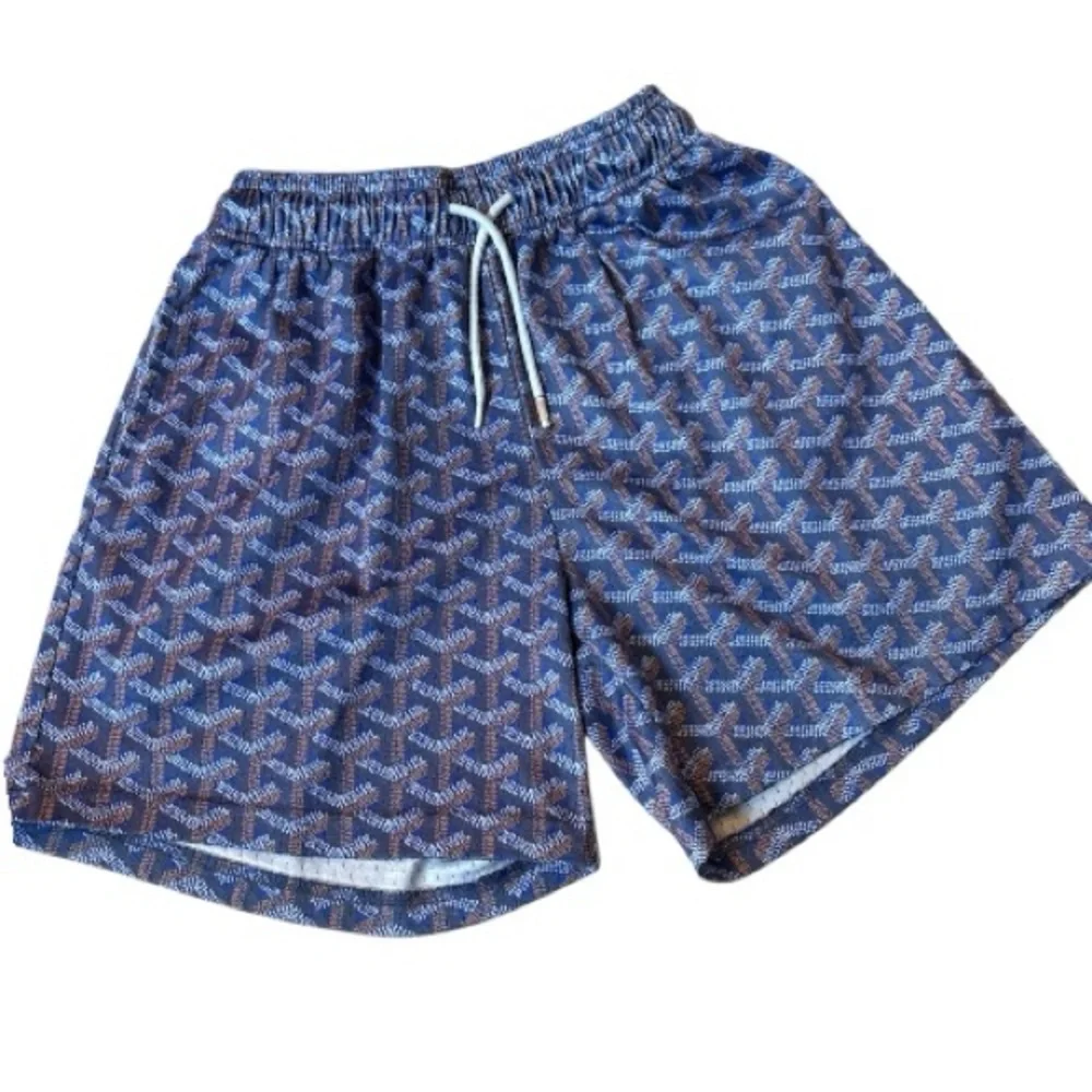 ⭐️ Mr. Remade Blue and Brown Patterned Shorts ⭐️ - Picture 1 of 3